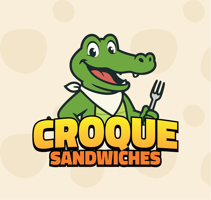 Logo for Croque Sandwiches featuring a happy green cartoon alligator wearing a bandana and holding a fork, with text "CROQUE SANDWICHES" in orange.