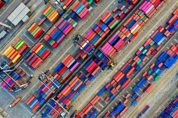 Photo by Tom Fisk: https://www.pexels.com/photo/aerial-photography-of-container-van-lot-3063470/