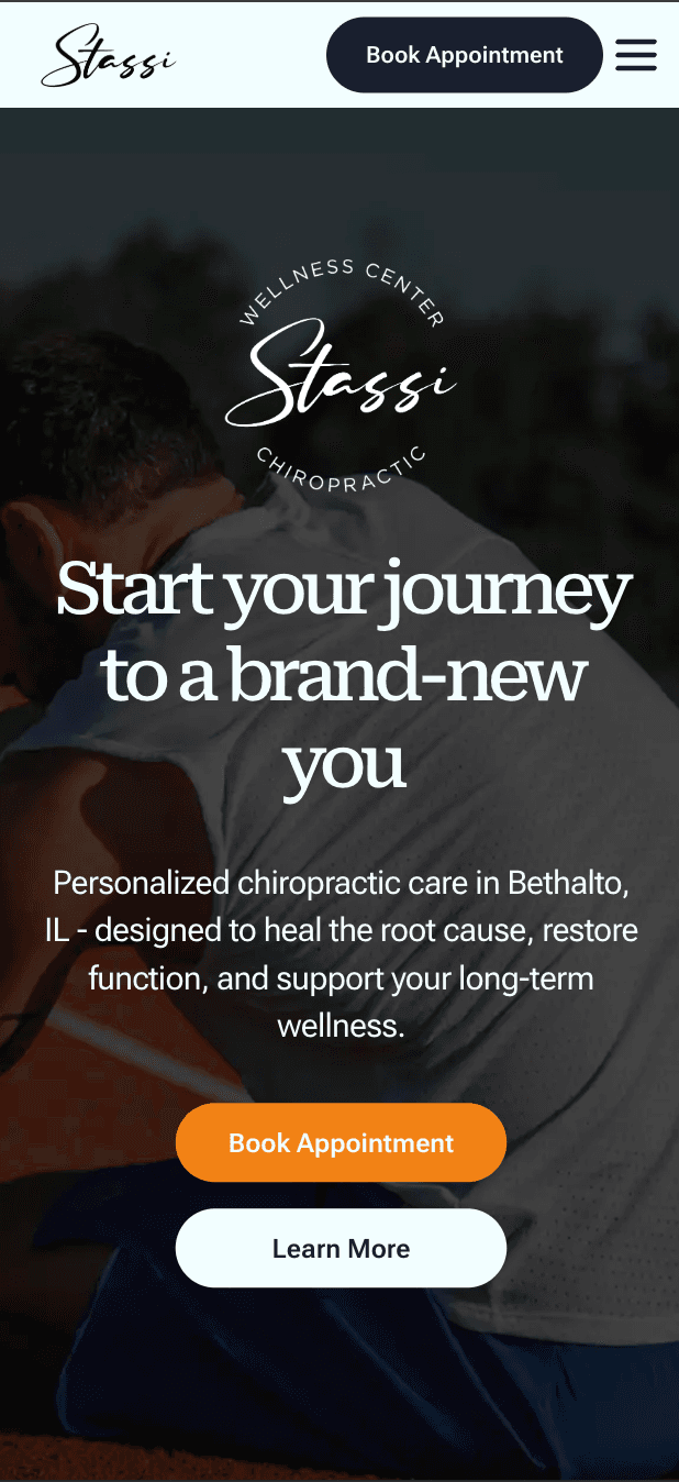Stassi Wellness Center website hero section featuring a dark, blurred athletic background with white text overlays, a prominent orange call-to-action button, and a clean, professional health-focused aesthetic.